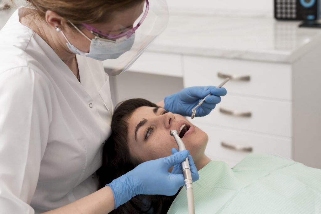 female-patient-having-procedure-done-dentist